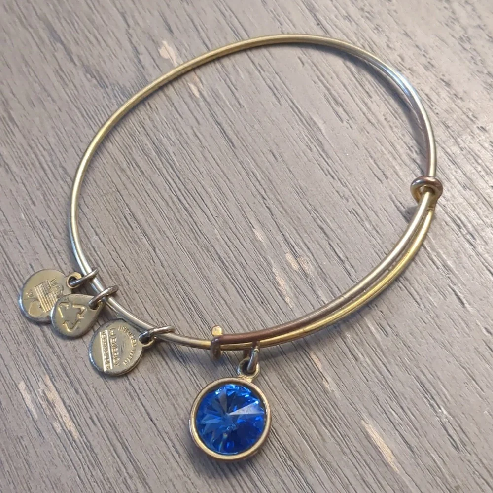 Alex and Ani Gold colored sapphire charm bracelet